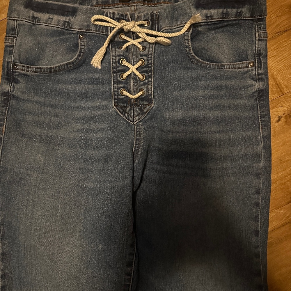 Pull on lace up waist jean